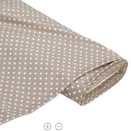 Tela de color beige con lunares