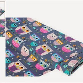 Tela gris con dibujos de búhos