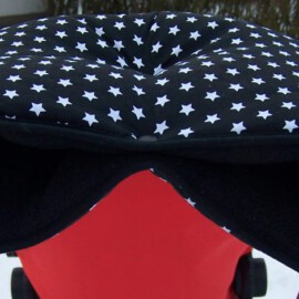 Manopla para cochecito , estrellas negras