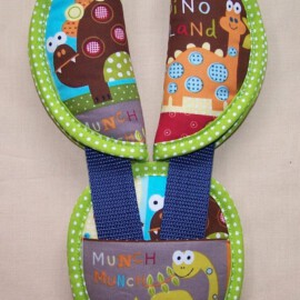Cubre cinturones con almohadilla ,dibujos de dinosaurios