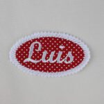 Oval patch with embroidered name