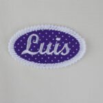 Oval patch with embroidered name