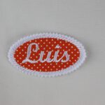 Oval patch with embroidered name