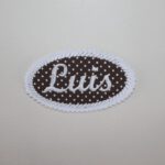 Oval patch with embroidered name