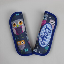 Cubre cinturones para silla de paseo ,con nombre bordado