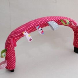 Protector para barra de seguridad , de color rosa cálido con lunares