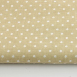 Tela de color beige con lunares