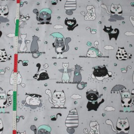 Tela  gris con dibujos de gatos