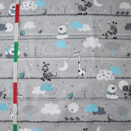 Tela de color gris con dibujos de animales
