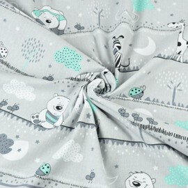 Tela de color gris con dibujos de animales