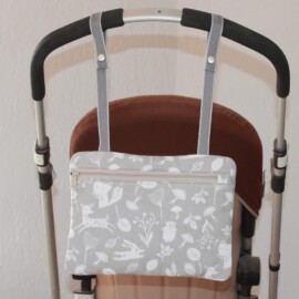Bolso para carritos de Bebés  ,animales de color blanco sobre fondo gris
