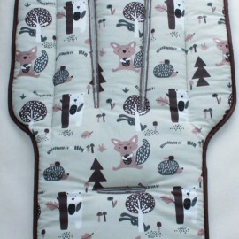 Colchoneta  para  "Cybex " , Tela de color beige con dibujos de animales